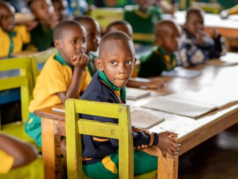 A boy at his desk in a RODA classroom